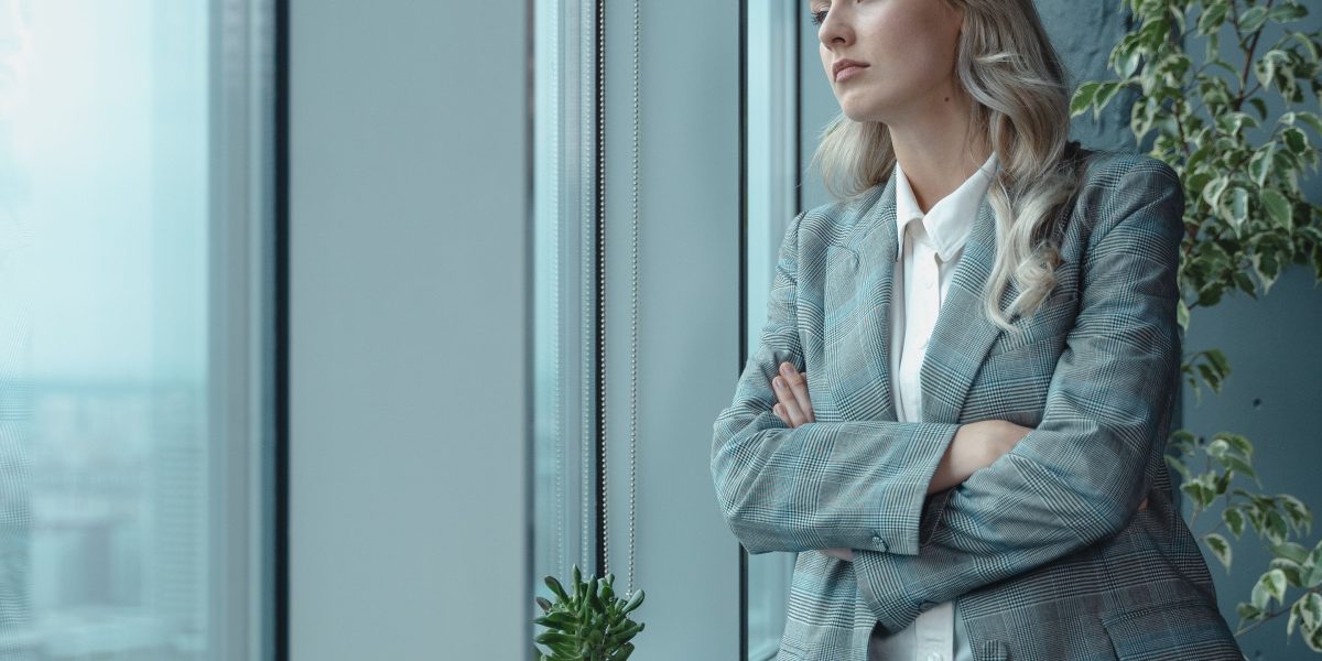 A person confidently reviews property documents, embodying the informed decision-making enabled by data analytics.