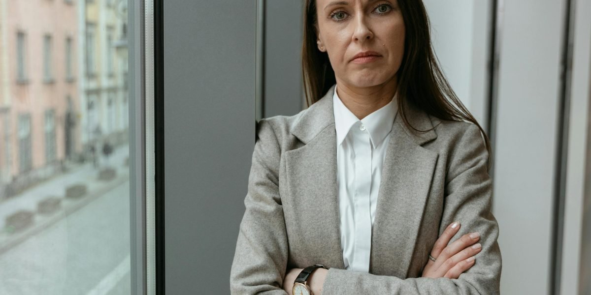 A confident real estate professional making informed decisions, symbolizing the impact of data analytics skills in a dynamic market.