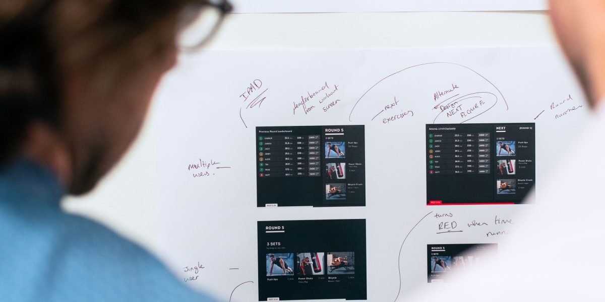 A team collaboratively strategizing, representing smart, data-driven decision-making in real estate.